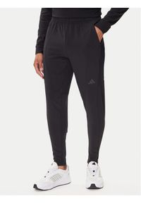 Adidas - adidas Spodnie dresowe Designed for Training Hybrid IY1123 Czarny Slim Fit. Kolor: czarny. Materiał: syntetyk