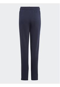 Adidas - adidas Spodnie dresowe Essentials 3-Stripes IC6128 Granatowy Slim Fit. Kolor: niebieski. Materiał: bawełna #5