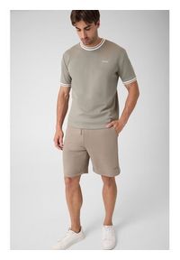 Guess Spodnie materiałowe 183578 Zielony Bermuda Fit. Kolor: zielony. Materiał: materiał #3