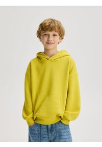 Reserved - Bluza oversize z kapturem - jasnożółty. Typ kołnierza: kaptur. Kolor: żółty. Materiał: bawełna, dzianina