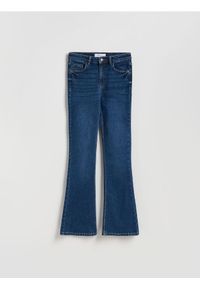 Reserved - Jeansy flare bootcut - granatowy. Kolor: niebieski