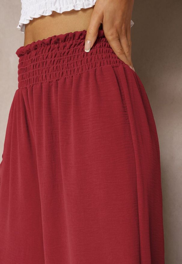 Renee - Bordowe Spodnie High Waist z Szerokimi Nogawkami i Gumką w Pasie Risabesa. Okazja: na co dzień. Stan: podwyższony. Kolor: czerwony. Styl: elegancki, casual