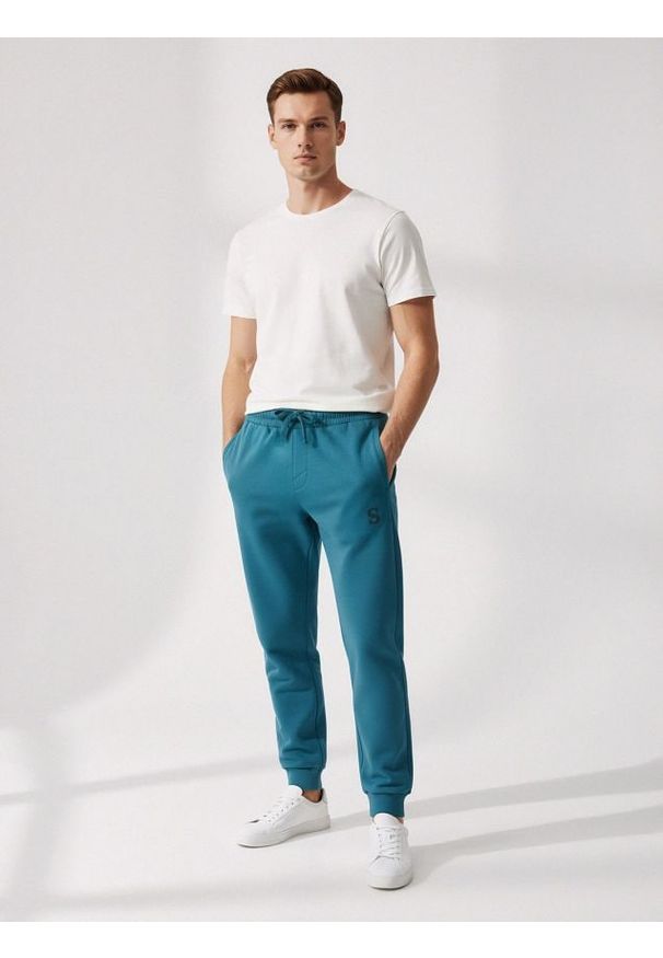 Sinsay - Spodnie jogger - niebieski. Kolor: niebieski