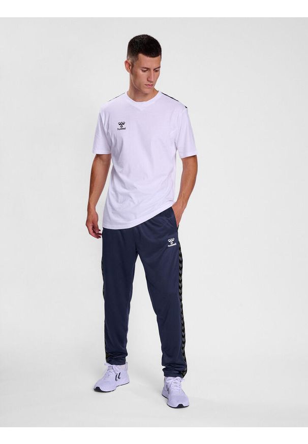 Spodnie dresowe polyesterowe Hummel Authentic. Kolor: niebieski. Materiał: dresówka. Sport: piłka nożna, fitness