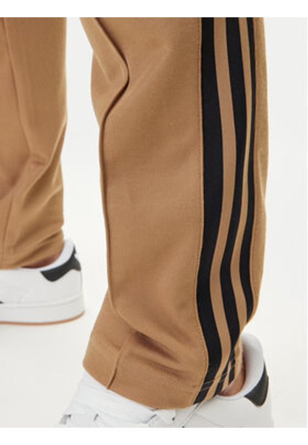 Adidas - adidas Spodnie dresowe adicolor Classics Beckenbauer JY1276 Beżowy Slim Fit. Kolor: beżowy. Materiał: bawełna