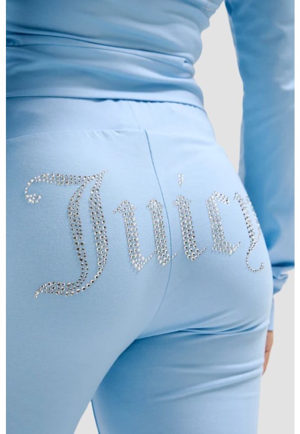 Juicy Couture - JUICY COUTURE Błękitne damskie spodnie dresowe Single Jersey Apollo Low Rise, Rozmiar S. Kolor: niebieski. Materiał: dresówka, jersey