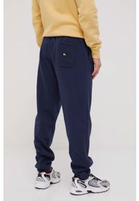 Quiksilver spodnie męskie kolor granatowy z nadrukiem. Kolor: niebieski. Materiał: dzianina. Wzór: nadruk
