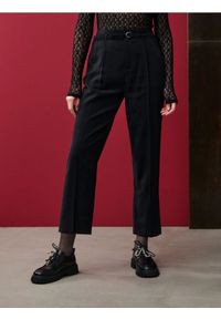 Sinsay - Spodnie carrot - czarny. Kolor: czarny #1