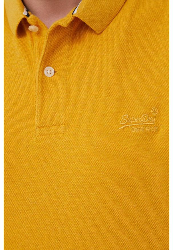 Superdry polo bawełniane kolor żółty gładki. Typ kołnierza: polo. Kolor: żółty. Materiał: bawełna. Długość: krótkie. Wzór: gładki
