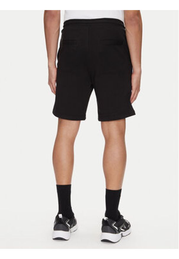 Calvin Klein Jeans Szorty sportowe Brush Stroke J30J327528 Czarny Regular Fit. Kolor: czarny. Materiał: bawełna. Styl: sportowy