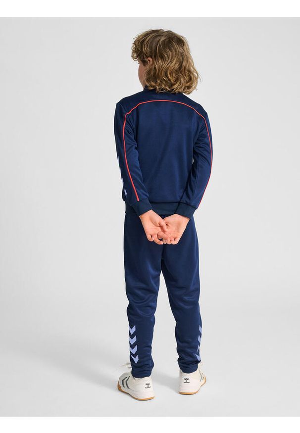 Dziecięcy dres Hummel. Kolor: niebieski, wielokolorowy, zielony. Materiał: dresówka. Styl: sportowy