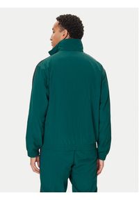 Adidas - adidas Bluza adicolor Woven Firebird JY1329 Zielony Loose Fit. Kolor: zielony. Materiał: syntetyk
