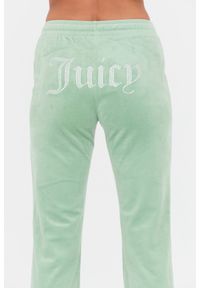 Juicy Couture - JUICY COUTURE Seledynowe spodnie dresowe Tina. Kolor: niebieski. Materiał: dresówka #3