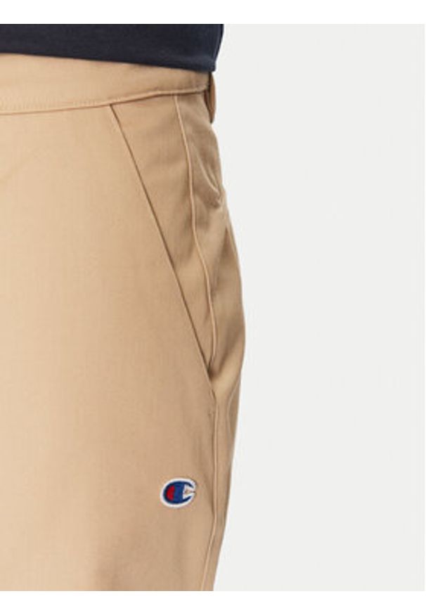 Champion Szorty sportowe 220765 Beżowy Standard Fit. Kolor: beżowy. Materiał: syntetyk. Styl: sportowy