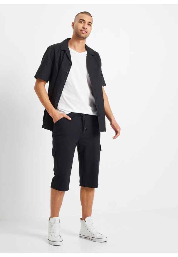 bonprix - Długie dresowe bermudy bojówki z czystej bawełny, regular fit. Kolor: czarny. Materiał: bawełna, dresówka. Długość: długie