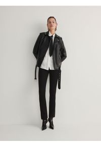 Reserved - Spodnie z rozcięciami - czarny. Kolor: czarny. Materiał: dzianina, wiskoza. Wzór: gładki #1