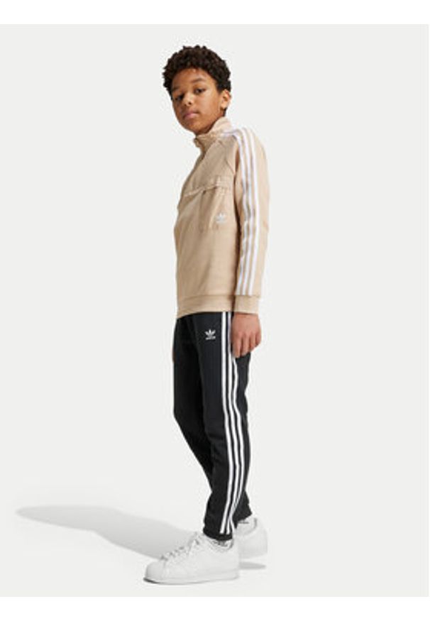 Adidas - adidas Spodnie dresowe Trefoil IY7484 Czarny Regular Fit. Kolor: czarny. Materiał: bawełna