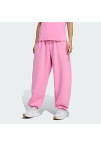 Adidas - Spodnie Soft Lux Loose. Kolor: różowy. Sport: fitness #1