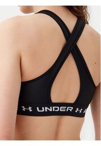 Under Armour Biustonosz sportowy Crossback Mid Bra 1361034 Czarny. Kolor: czarny. Materiał: syntetyk