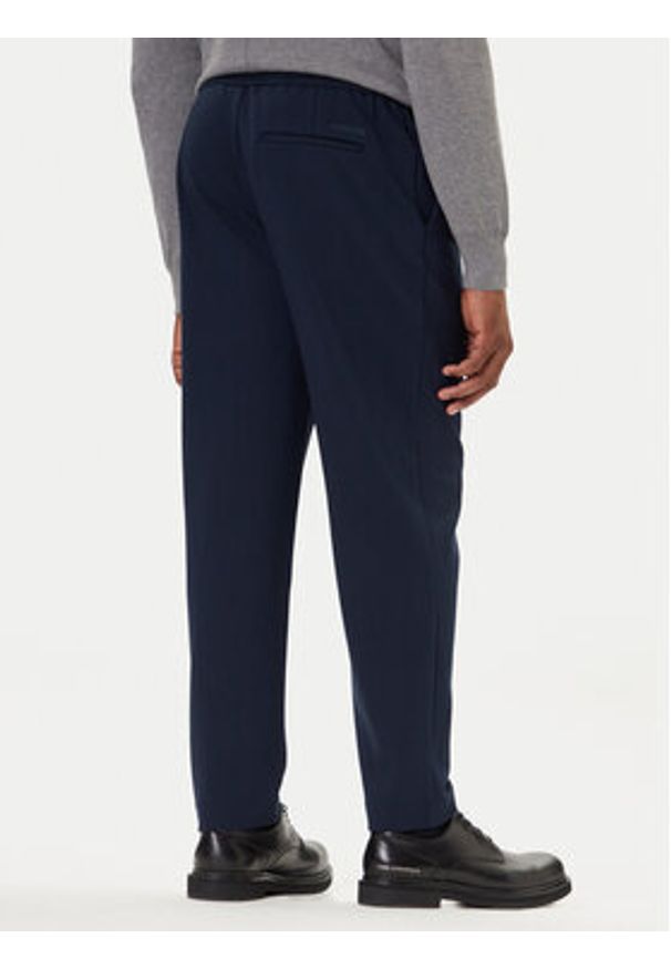 Calvin Klein Chinosy LV04LE613G Granatowy Slim Fit. Kolor: niebieski. Materiał: wiskoza