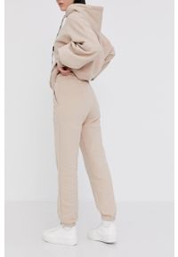 Answear Lab Spodnie damskie kolor beżowy gładkie. Kolor: beżowy. Materiał: dzianina, poliester, bawełna. Wzór: gładki