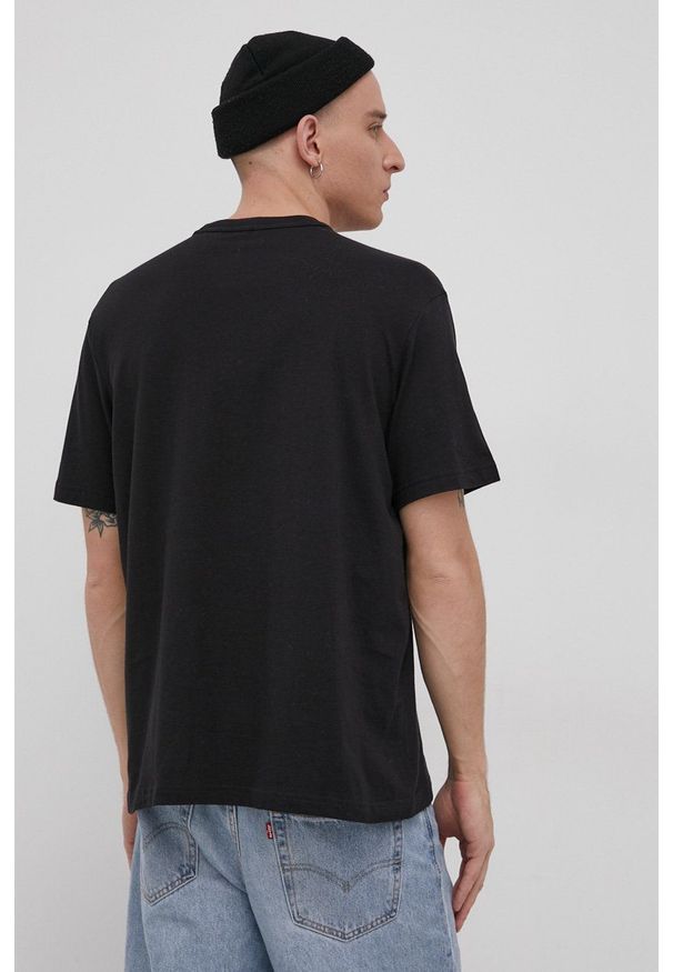 Reebok Classic - T-shirt. Okazja: na co dzień. Kolor: czarny. Materiał: dzianina. Wzór: nadruk. Styl: casual