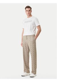 Guess Spodnie dresowe Z6GB03 K2850 Beżowy Regular Fit. Kolor: beżowy. Materiał: syntetyk #3