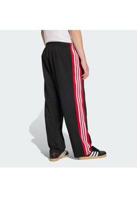 Adidas - adidas Spodnie dresowe KE0117 Czarny Loose Fit. Kolor: czarny. Materiał: syntetyk #4
