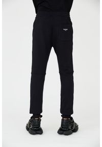 Balmain - BALMAIN Czarne spodnie dresowe RIbbed Flock Sweatpants. Kolor: czarny. Materiał: dresówka #6