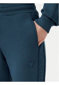 Guess Spodnie dresowe V2YB18 K7UW2 Niebieski Regular Fit. Kolor: niebieski. Materiał: wiskoza #2