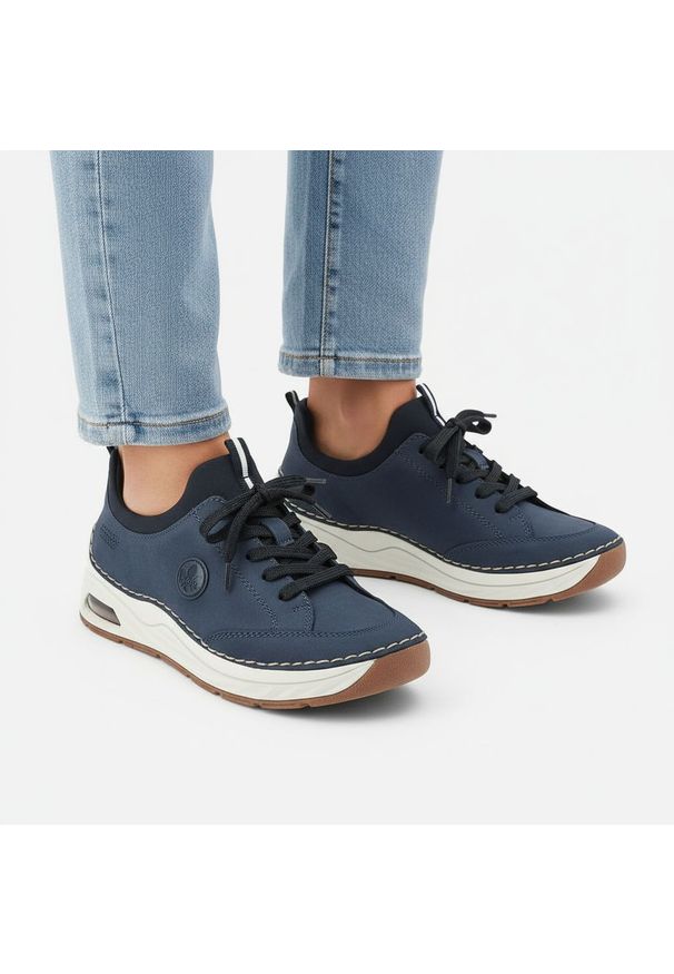 Półbuty damskie Rieker, cholewka ze skóry ekologicznej gładkiej klasyczne wsuwane lekka sportowa forma amortyzowana podeszwa, niebieskie, 44562-14. Okazja: na spacer, na co dzień. Zapięcie: bez zapięcia. Kolor: niebieski. Materiał: skóra ekologiczna. Szerokość cholewki: normalna. Wzór: gładki. Styl: klasyczny, sportowy