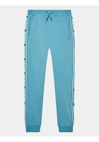 Guess Spodnie dresowe L2YQ48 K6ZS1 Niebieski Regular Fit. Kolor: niebieski. Materiał: bawełna