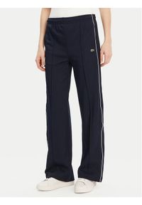 Lacoste Spodnie dresowe XF7260 Granatowy Relaxed Fit. Kolor: niebieski. Materiał: syntetyk, bawełna #1