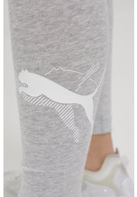 Puma legginsy Power Graphic damskie kolor szary z nadrukiem. Kolor: szary. Materiał: skóra, dzianina, bawełna. Wzór: nadruk
