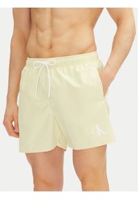 Calvin Klein Swimwear Szorty kąpielowe KM0KM01101 Beżowy Regular Fit. Kolor: beżowy. Materiał: syntetyk