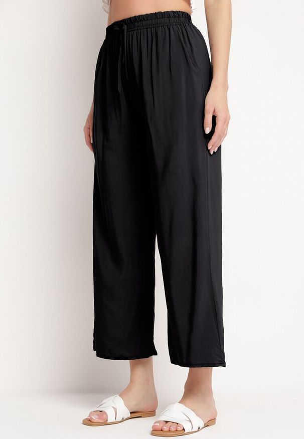 Born2be - Czarne Bawełniane Spodnie z Szerokimi Nogawkami Palazzo z Gumką w Pasie Nesira. Okazja: na co dzień. Kolor: czarny. Materiał: bawełna. Styl: elegancki, casual