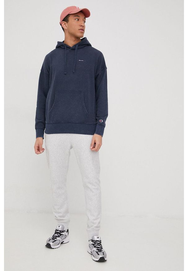 Champion spodnie dresowe 217238 męskie kolor szary melanżowe. Kolor: szary. Materiał: dresówka. Wzór: melanż