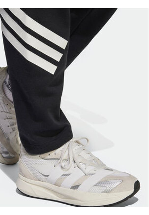 Adidas - adidas Spodnie dresowe Future Icons 3-Stripes JJ4808 Czarny Regular Fit. Kolor: czarny. Materiał: bawełna