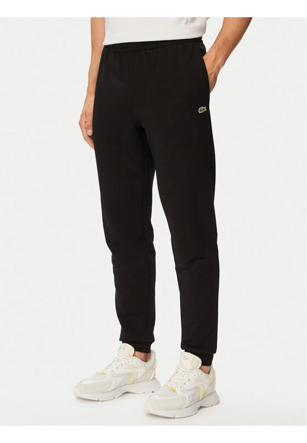 Lacoste Spodnie dresowe XH9833 Czarny Regular Fit. Kolor: czarny. Materiał: bawełna