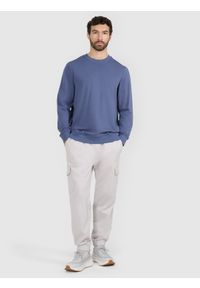 4f - 4F Bluza dresowa nierozpinana bez kaptura męska - niebieska XL. Okazja: na co dzień. Typ kołnierza: bez kaptura. Kolor: niebieski. Materiał: dresówka. Wzór: gładki, ze splotem. Styl: klasyczny, casual, sportowy #2