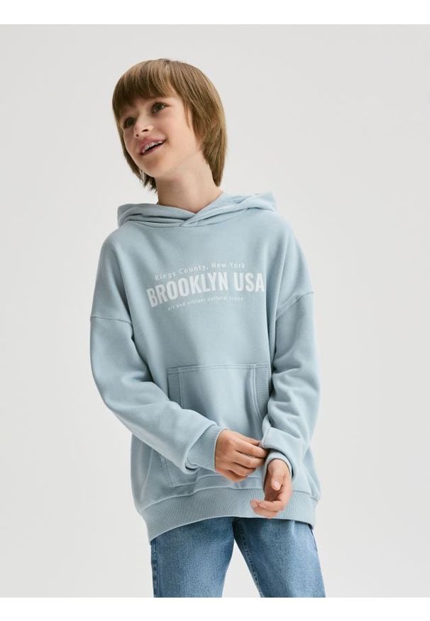 Reserved - Bawełniana bluza oversize - jasnoniebieski. Kolor: niebieski. Materiał: bawełna