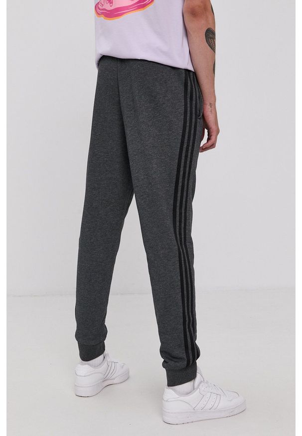 Adidas - adidas Spodnie H12256 męskie kolor szary gładkie. Kolor: szary. Materiał: bawełna, dzianina, poliester. Wzór: gładki