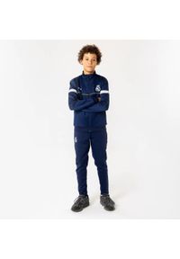Dres treningowy Real Madrid dla dzieci 25/26 - granatowy. Kolor: niebieski, wielokolorowy. Materiał: dresówka. Styl: sportowy #1