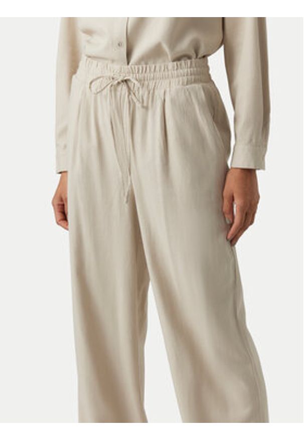 Vero Moda Spodnie materiałowe Jesmilo 10287363 Beżowy jasny Regular Fit. Kolor: beżowy. Materiał: len