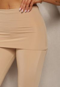Renee - Beżowe Elastyczne Spodnie o Kroju Dzwonów High Waist z Modelującego Materiału Ivolea. Stan: podwyższony. Kolor: beżowy. Materiał: materiał #5