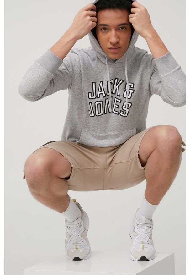 Jack & Jones bluza męska kolor szary z kapturem melanżowa. Okazja: na co dzień. Typ kołnierza: kaptur. Kolor: szary. Materiał: dzianina. Wzór: melanż. Styl: casual