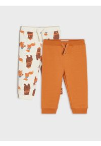 Sinsay - Spodnie dresowe 2 pack - kremowy. Kolor: kremowy. Materiał: dresówka. Długość: długie. Wzór: motyw zwierzęcy #1