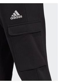 Adidas - adidas Spodnie dresowe Essentials Fleece Regular Tapered Cargo Joggers HL2226 Czarny Regular Fit. Kolor: czarny. Materiał: dresówka, bawełna #5
