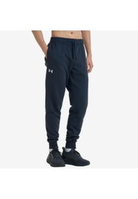 Under Armour - Spodnie dresowe męskie UA Rival Fleece. Kolor: czarny. Materiał: dresówka. Sport: joga i pilates #1