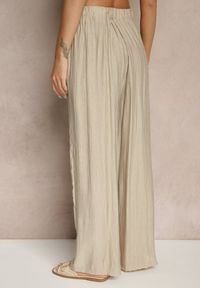 Renee - Beżowe Spodnie o Szerokim Kroju High Waist Natoreia. Okazja: na co dzień. Stan: podwyższony. Kolor: beżowy. Styl: boho, klasyczny, elegancki, casual